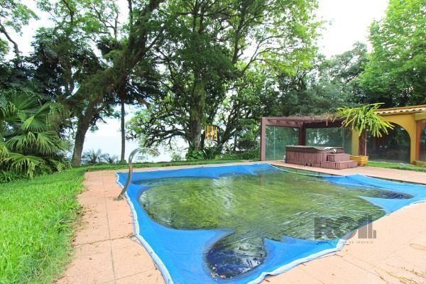 Casa em Porto Alegre, no bairro Pedra Redonda, com 7 dormitório(s), e 7 banheiro