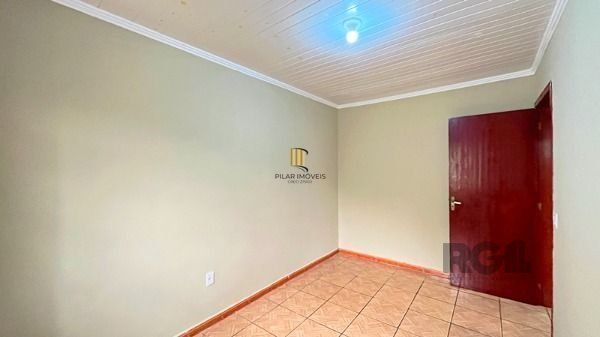 Casa em Porto Alegre, no bairro Vila Nova, com 2 dormitório(s), à venda.