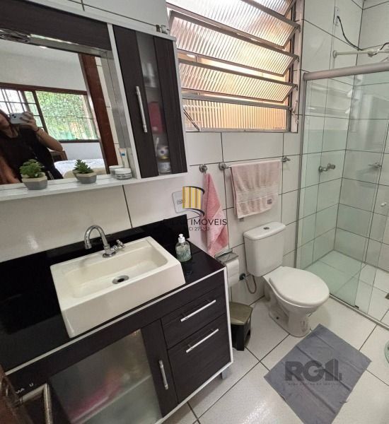 Casa térrea de 3D no miolo do Bairro Tristeza.