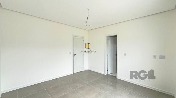 Casa Condominio em Porto Alegre, no bairro Campo Novo, com 3 dormitório(s), e 3 