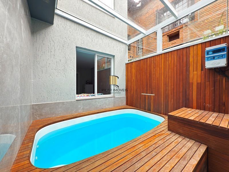 Casa contemporânea, 4 d, sendo 2 suítes, uma no térreo,206 m² , bairro tristeza