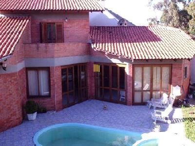 Casa em Porto Alegre, no bairro Jardim Isabel, com 4 dormitório(s), à venda.