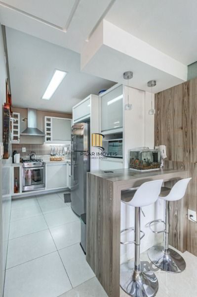 Casa Condominio em Porto Alegre, no bairro Vila Conceição, com 3 dormitório(s), 