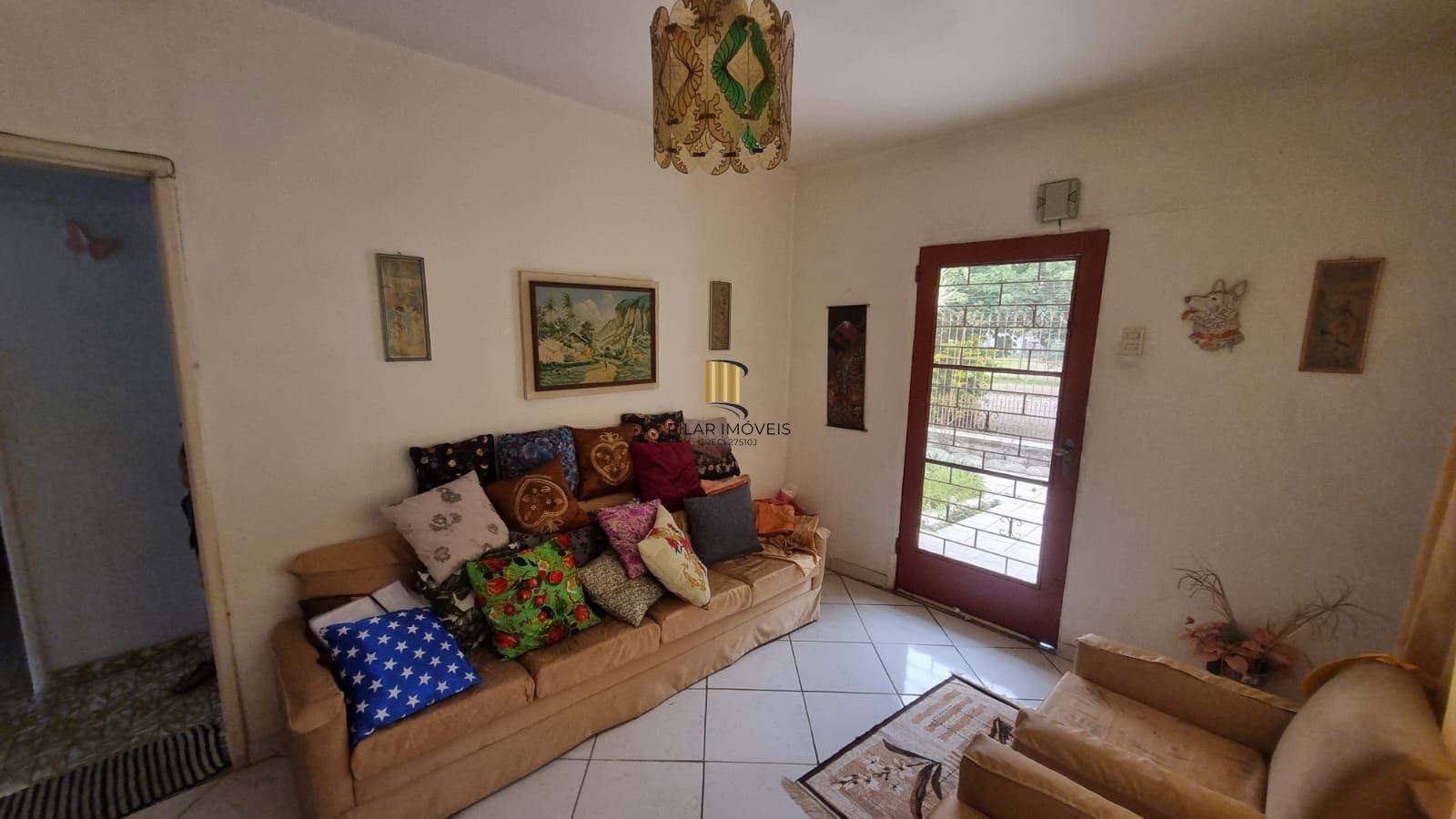 Linda residência com 3 dormitórios no Bairro Cavalhada.