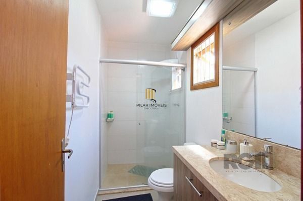 Casa Condominio em Porto Alegre, no bairro Tristeza, com 3 dormitório(s), e 3 ba