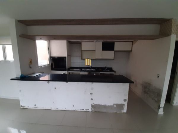 Casa Condominio em Porto Alegre, no bairro Ipanema, com 3 dormitório(s), e 3 ban