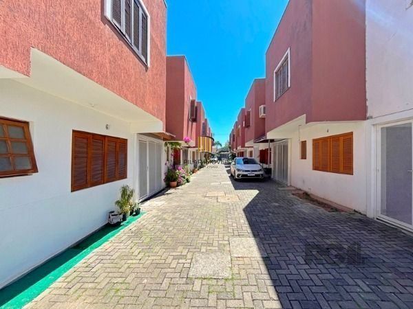 Casa Condominio em Porto Alegre, no bairro Tristeza, com 3 dormitório(s), e 3 ba