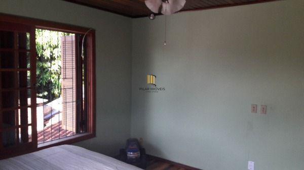 Casa em Porto Alegre, no bairro Aberta dos Morros, com 4 dormitório(s), e 4 banh