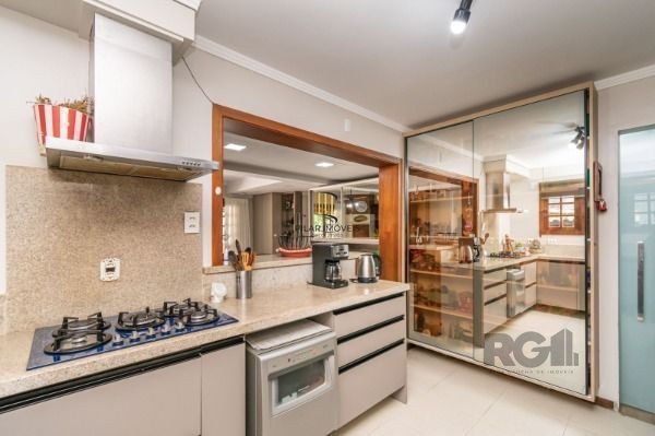 Residência com 4 dormitórios á venda no Bairro Jardim Izabel.