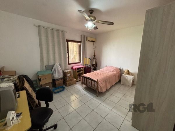 Casa térrea de 3D no miolo do Bairro Tristeza.