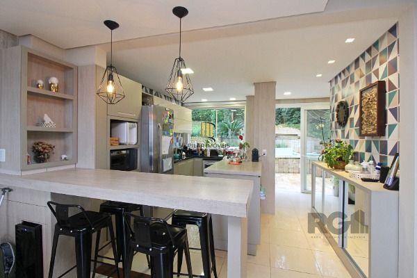 Casa Condominio em Porto Alegre, no bairro Sétimo Céu, com 4 dormitório(s), e 4 