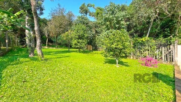 Casa em Porto Alegre, no bairro Nonoai, com 4 dormitório(s), à venda.