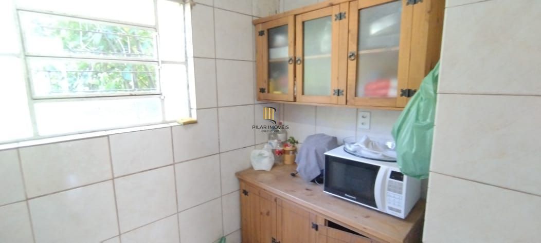 Casa em Condomínio 2 dormitórios à venda Guarujá Porto Alegre/RS