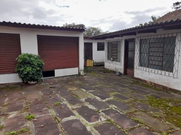Casa para Venda - 420m², 2 dormitórios, sendo 1 suites, 4 vagas - Nonoai - Pilar Imóveis