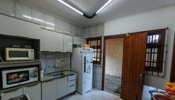 Casa em Porto Alegre, no bairro Cavalhada, com 5 dormitório(s), e 5 banheiros, à