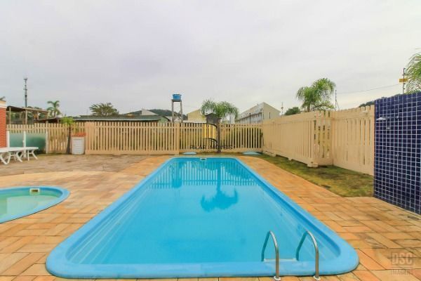 Carrara- Casa térrea 2 dormitórios, reformada , com 2 vagas , churrasqueira