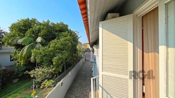 Casa Condominio em Porto Alegre, no bairro Tristeza, com 3 dormitório(s), e 3 ba