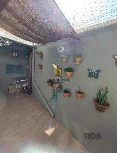 Casa em Porto Alegre, no bairro Hípica, com 3 dormitório(s), e 3 banheiros, à ve