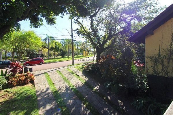Casa Condominio em Porto Alegre, no bairro Cavalhada, com 4 dormitório(s), e 4 b