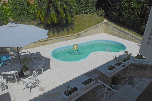 Casa em Porto Alegre, no bairro Espirito Santo, com 3 dormitório(s), e 3 banheir