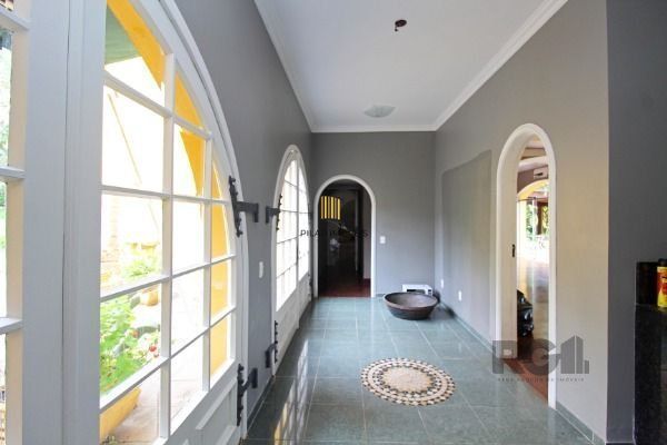 Casa em Porto Alegre, no bairro Pedra Redonda, com 7 dormitório(s), e 7 banheiro