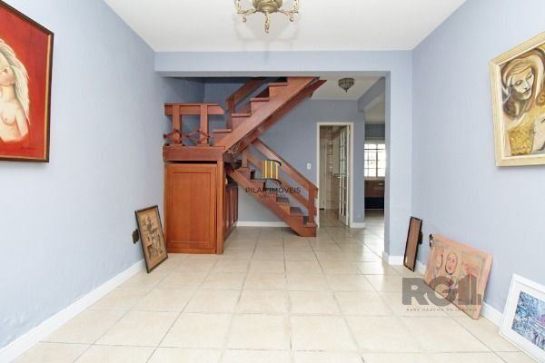 Casa Condominio em Porto Alegre, no bairro Guarujá, com 3 dormitório(s), e 3 ban
