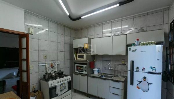 Casa em Porto Alegre, no bairro Cavalhada, com 5 dormitório(s), e 5 banheiros, à