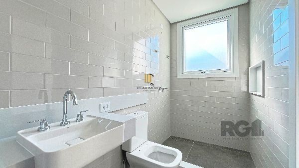 Casa Condominio em Porto Alegre, no bairro Hípica, com 3 dormitório(s), e 3 banh