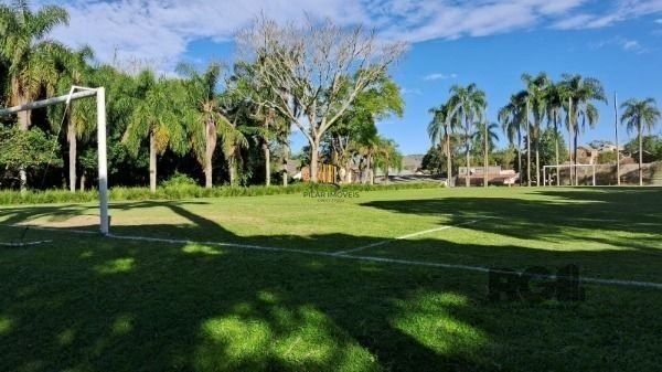 Casa Condominio em Porto Alegre, no bairro Cavalhada, com 4 dormitório(s), e 4 b
