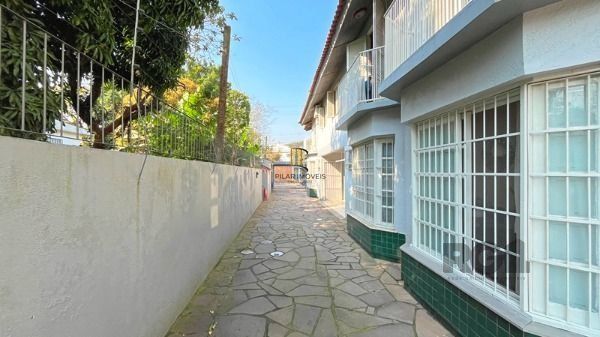 Casa Condominio em Porto Alegre, no bairro Tristeza, com 3 dormitório(s), e 3 ba