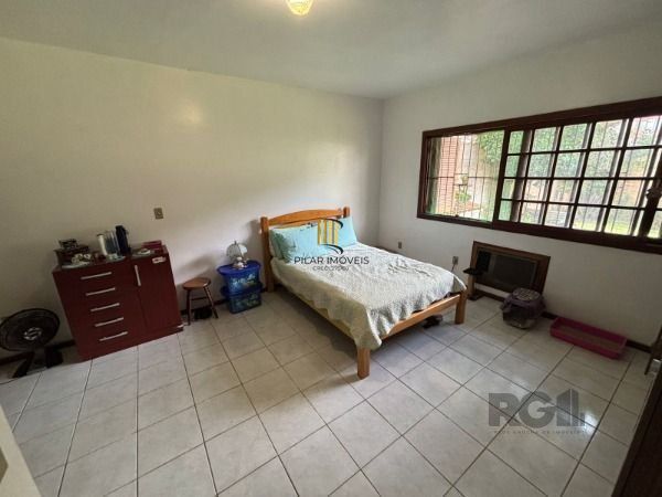 Casa térrea de 3D no miolo do Bairro Tristeza.