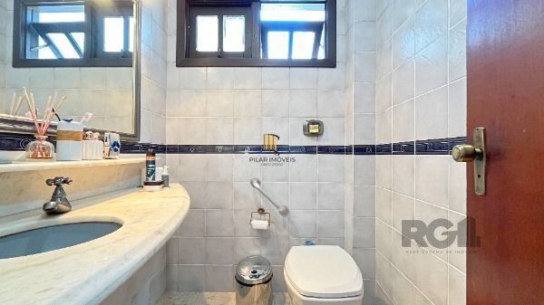 Casa 4 dormitórios à venda Camaquã Porto Alegre/RS