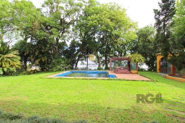 Casa em Porto Alegre, no bairro Pedra Redonda, com 7 dormitório(s), e 7 banheiro