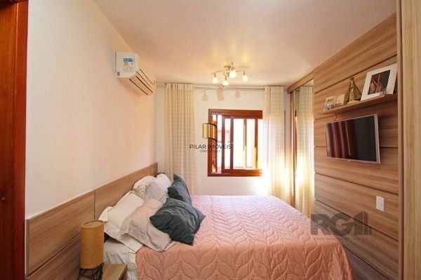 Casa Condominio em Porto Alegre, no bairro Tristeza, com 3 dormitório(s), e 3 ba