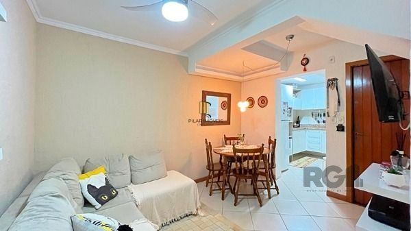 Casa Condominio em Porto Alegre, no bairro Guarujá, com 2 dormitório(s), e 2 ban