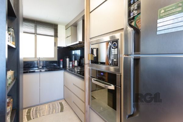 Apartamento em Porto Alegre, no bairro Cavalhada, com 3 dormitório(s), e 3 banhe