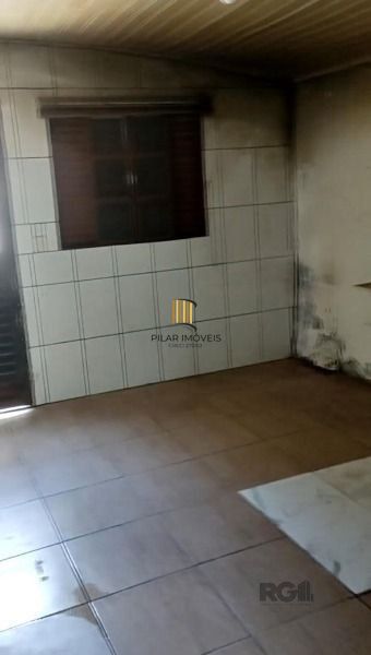 Casa em Porto Alegre, no bairro Vila Nova, com 3 dormitório(s), e 3 banheiros, à
