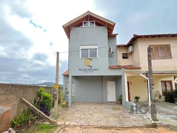 Casa Condominio em Porto Alegre, no bairro Campo Novo, com 3 dormitório(s), e 3 