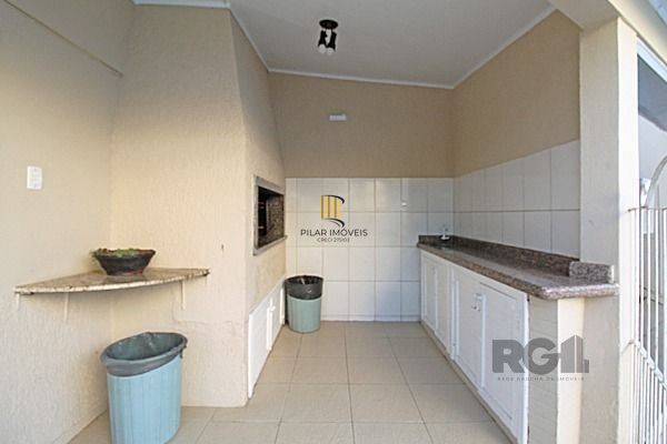 Casa Condominio em Porto Alegre, no bairro Guarujá, com 3 dormitório(s), e 3 ban