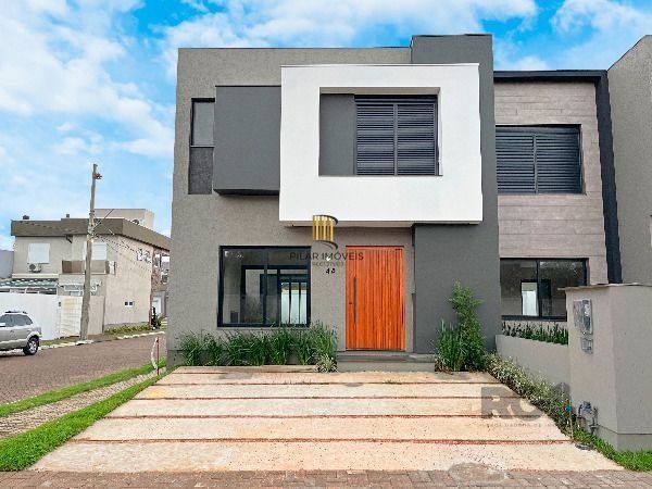 Casa Condominio em Porto Alegre, no bairro Hípica, com 3 dormitório(s), e 3 banh