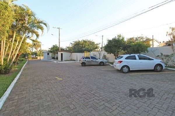 Casa Condominio em Porto Alegre, no bairro Guarujá, com 3 dormitório(s), e 3 ban