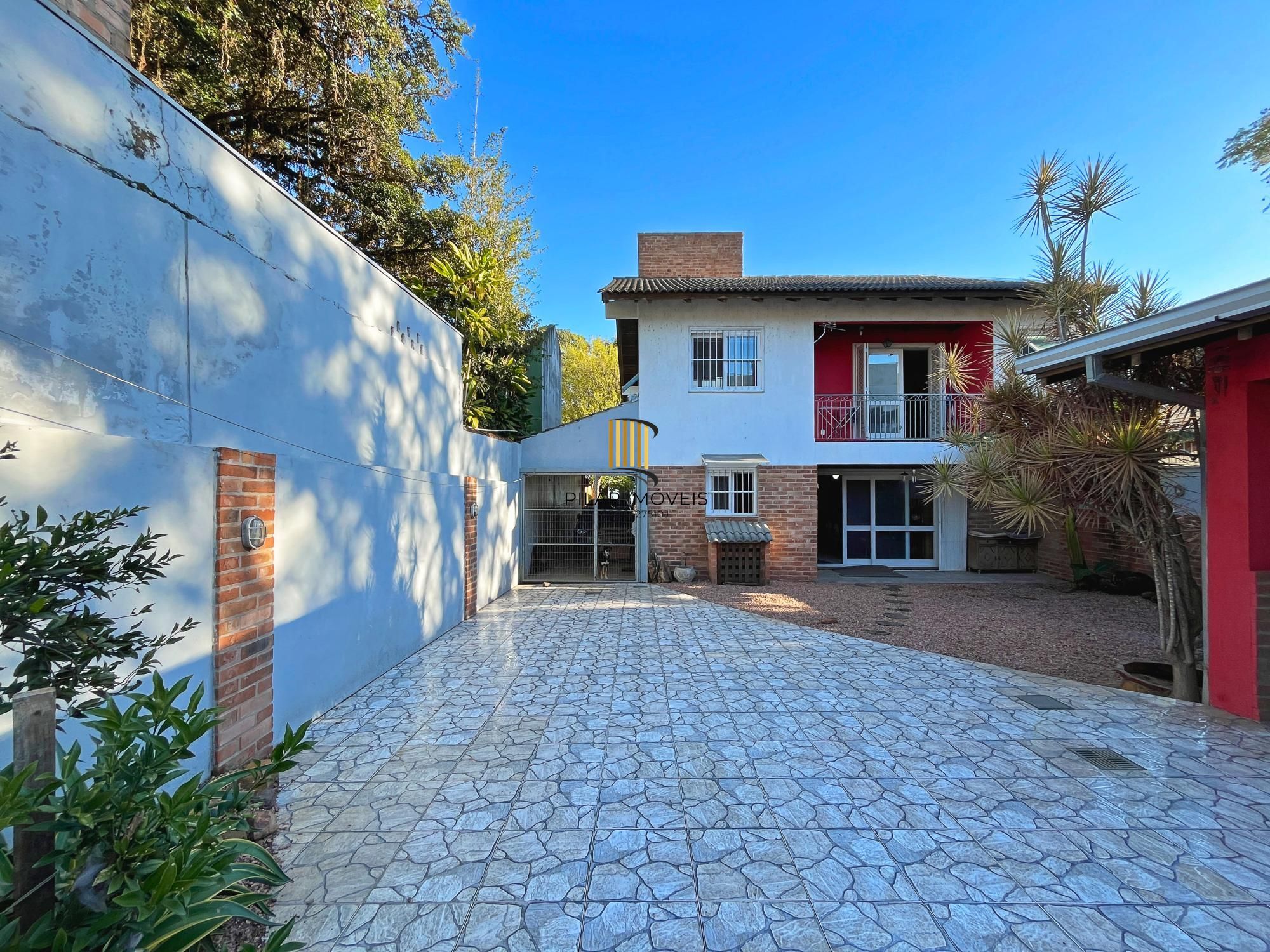 Casa 4 dormitórios no bairro Ipanema