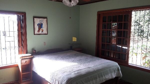 Casa em Porto Alegre, no bairro Aberta dos Morros, com 4 dormitório(s), e 4 banh