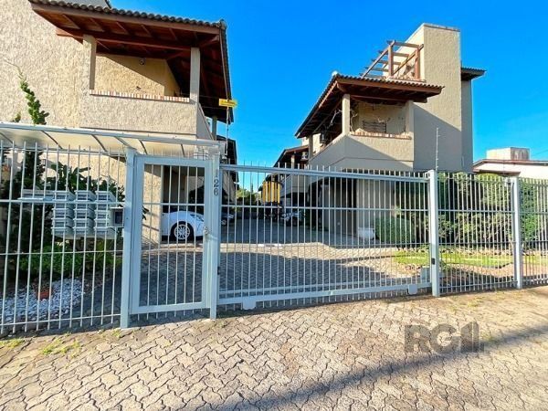 Casa Condominio em Porto Alegre, no bairro Guarujá, com 2 dormitório(s), e 2 ban - Pilar Imóveis