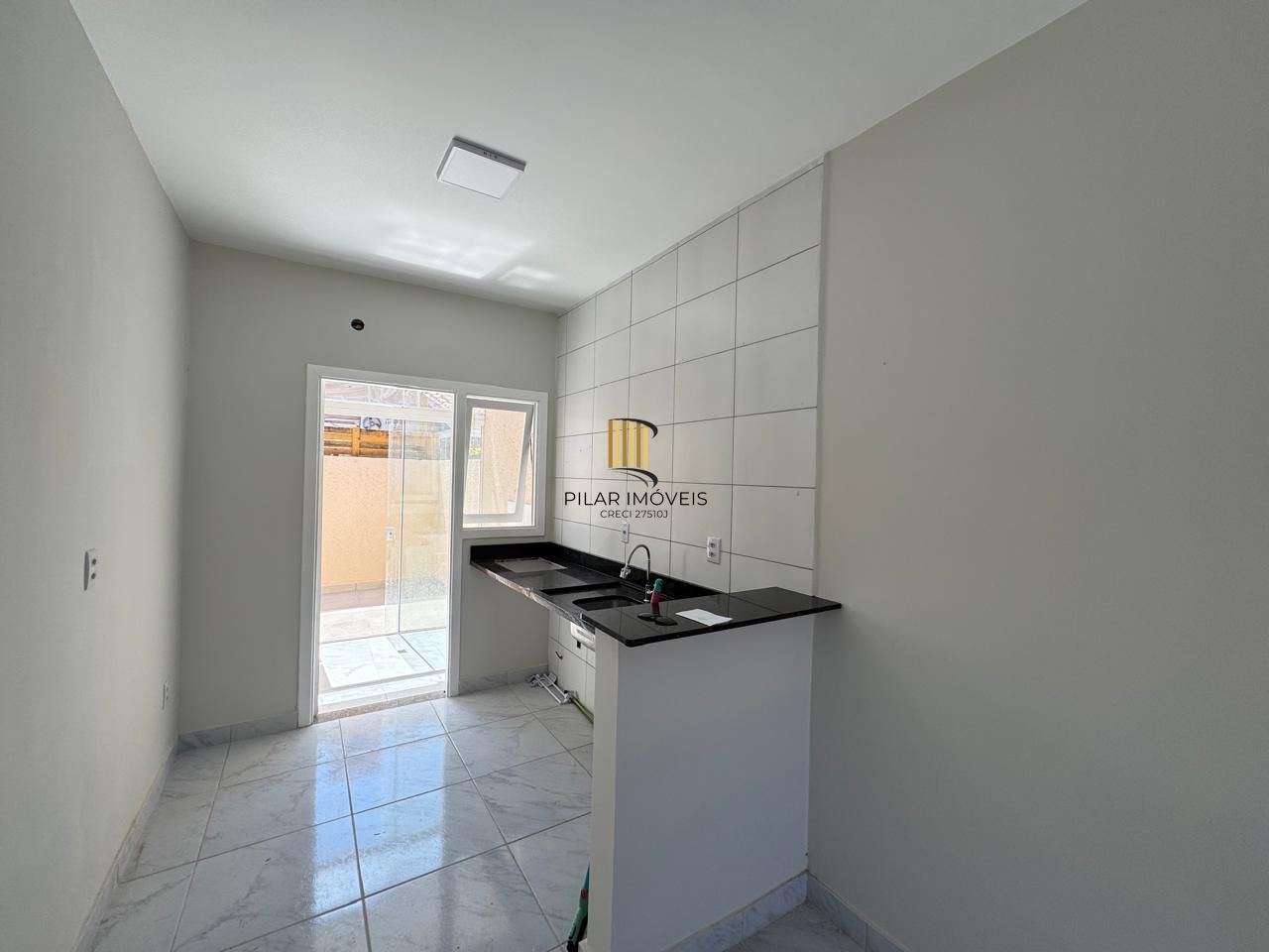 Carrara- Casa térrea 2 dormitórios, reformada , com 2 vagas , churrasqueira