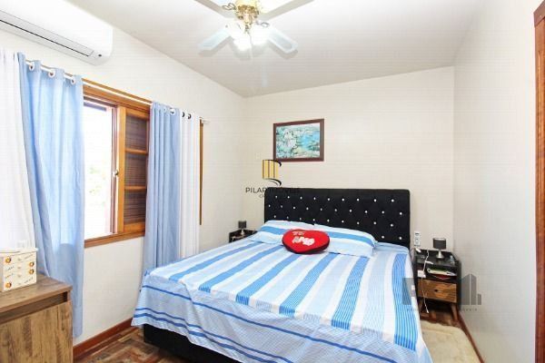 Sobrado em Porto Alegre, no bairro Vila Nova, com 3 dormitório(s), e 3 banheiros