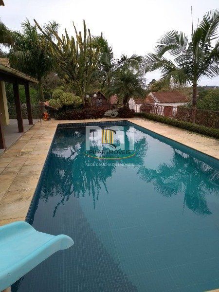 Casa para Venda - 741m², 5 dormitórios, sendo 3 suites, 9 vagas - Espirito Santo