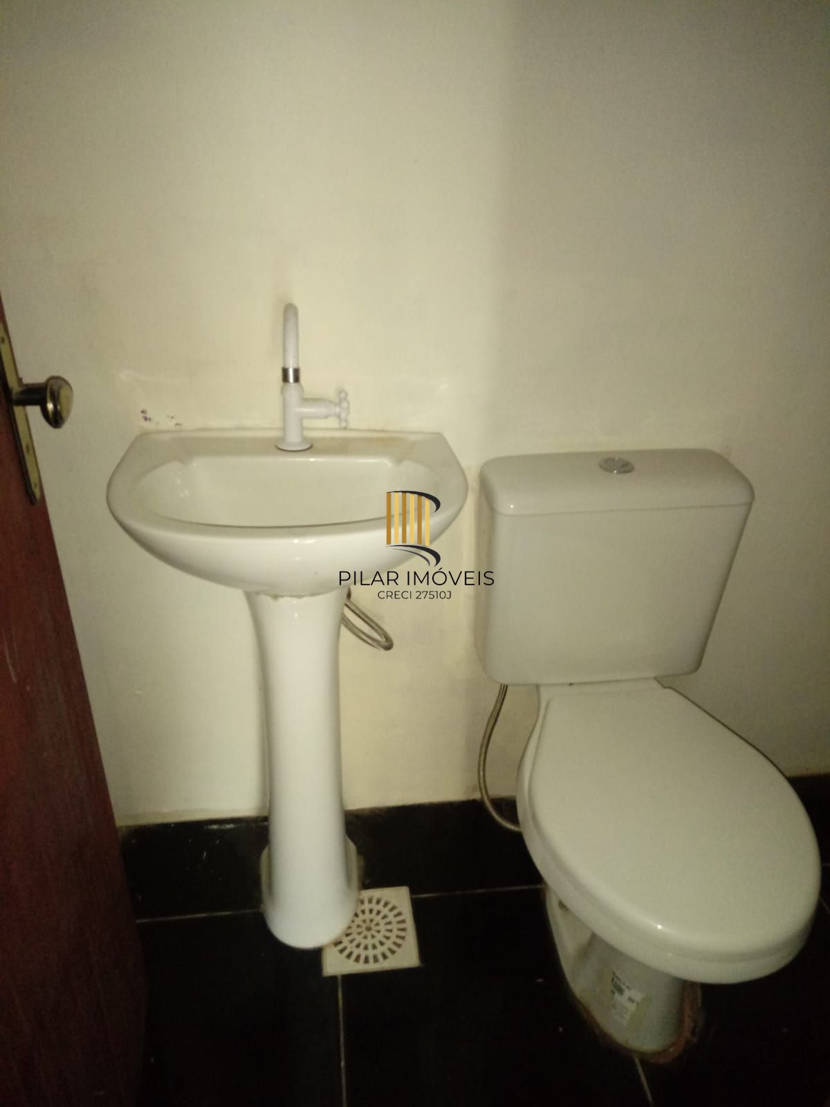 Casa 2 dormitórios à venda Guarujá Porto Alegre/RS