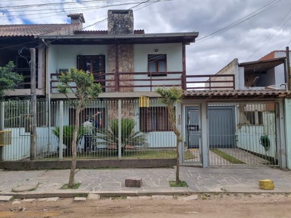 Sobrado em Porto Alegre, no bairro Ponta Grossa, com 4 dormitório(s), e 4 banhei
