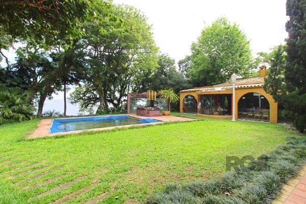 Casa em Porto Alegre, no bairro Pedra Redonda, com 7 dormitório(s), e 7 banheiro